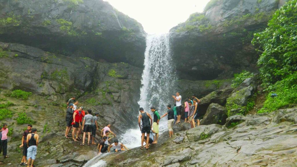 Tourists enjoying at Tiger's Leap waterfall in Lonavala